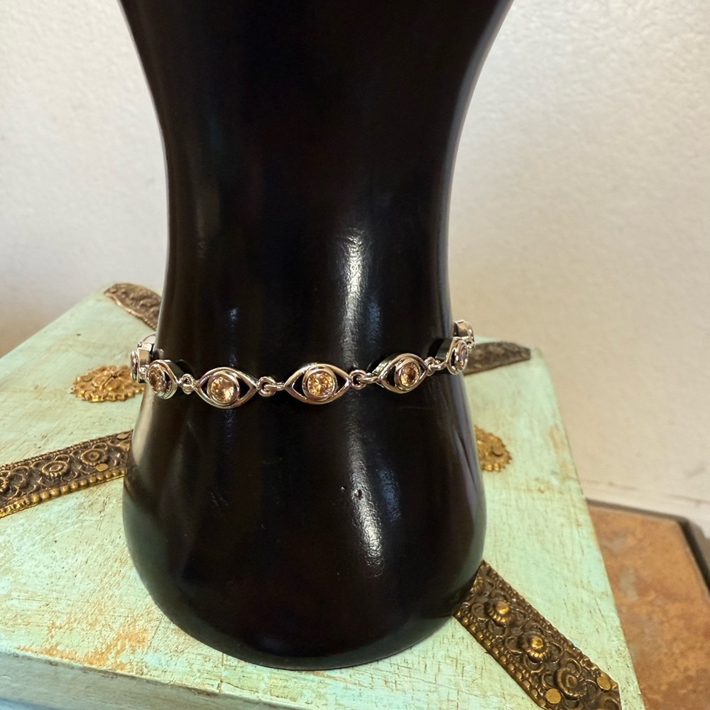 NWOT Silver Toned Bracelet With Gold Toned Crystals